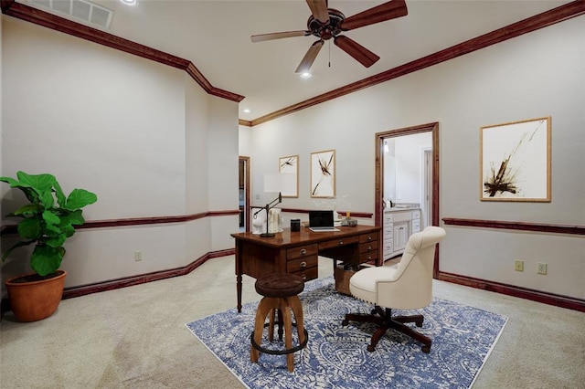 home office featuring a ceiling fan, carpet, visible vents, and baseboards