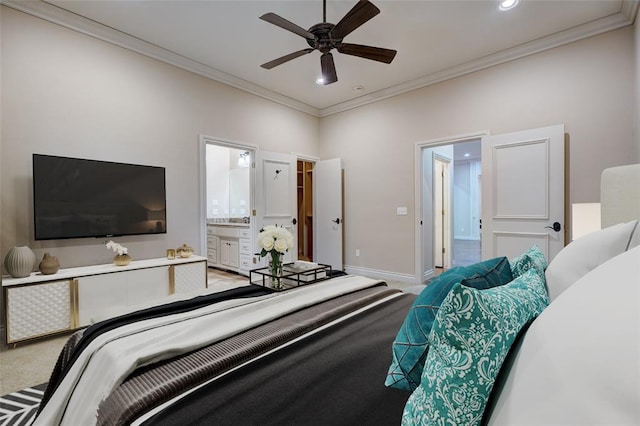 bedroom with baseboards, ensuite bath, crown molding, carpet flooring, and recessed lighting