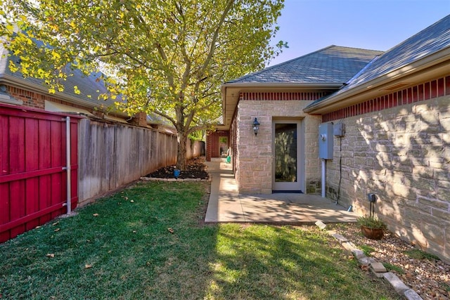 view of yard featuring a fenced backyard and a patio