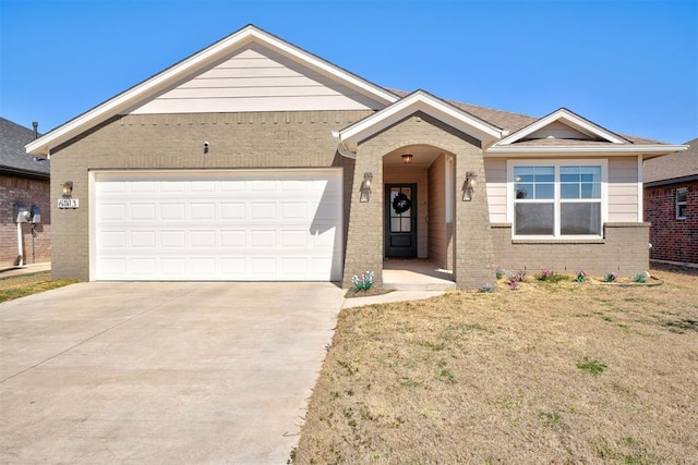 single story home with a front lawn, concrete driveway, brick siding, and an attached garage