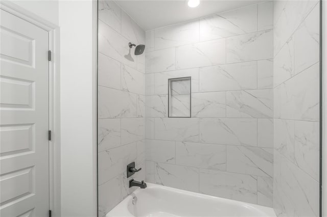 bathroom with shower / bath combination