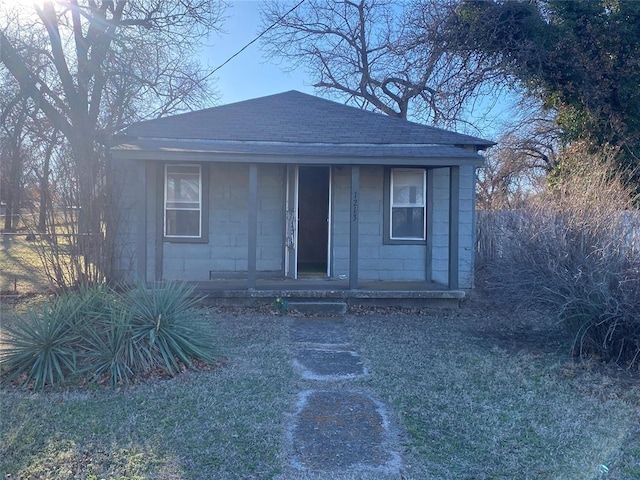 view of outbuilding featuring covered porch