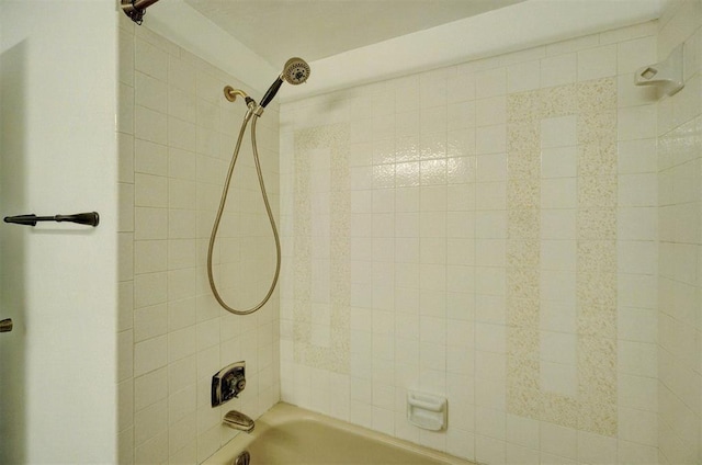 bathroom with shower / tub combination