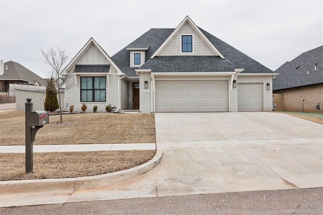 view of front of home with board and batten siding, roof with shingles, concrete driveway, and brick siding