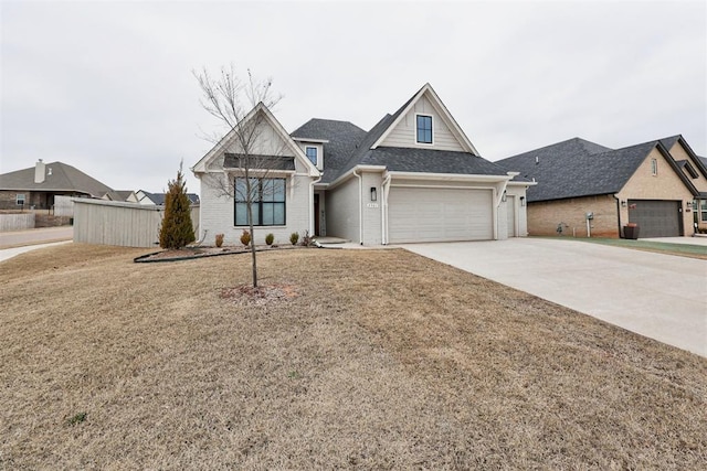 view of front of property with brick siding, concrete driveway, roof with shingles, an attached garage, and a front yard