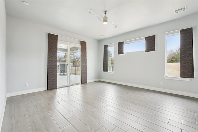 2725 Piazza Ct, Arcadia, OK 73007 - spare room featuring baseboards and wood finished floors