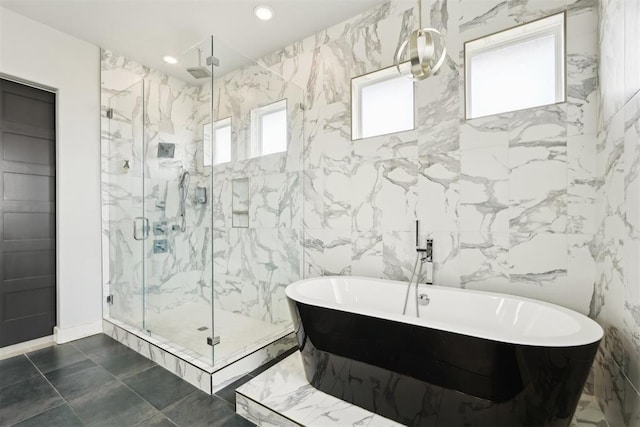 2725 Piazza Ct, Arcadia, OK 73007 - bathroom with a marble finish shower, a freestanding bath, tile walls, and recessed lighting