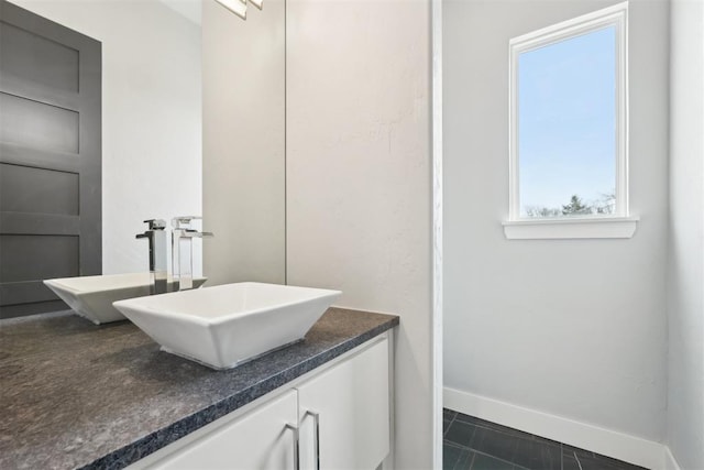 2725 Piazza Ct, Arcadia, OK 73007 - bathroom featuring vanity and baseboards