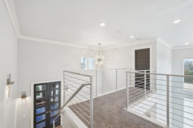 2725 Piazza Ct, Arcadia, OK 73007 - hallway featuring an upstairs landing, ornamental molding, recessed lighting, carpet flooring, and a chandelier