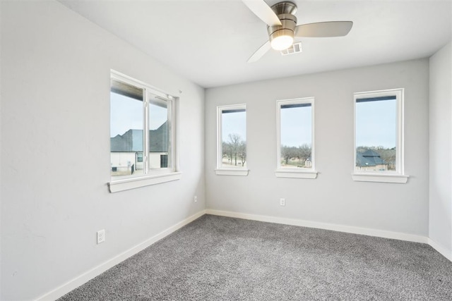 2725 Piazza Ct, Arcadia, OK 73007 - carpeted spare room with baseboards and a ceiling fan