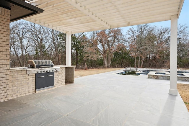2725 Piazza Ct, Arcadia, OK 73007 - view of patio featuring exterior kitchen and view of wooded area