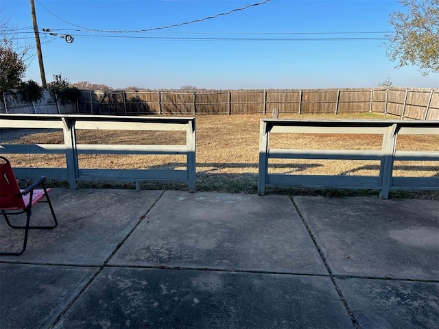 view of yard with a fenced backyard and a patio