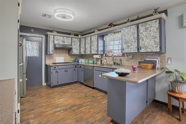 kitchen featuring gray cabinetry, a peninsula, a sink, visible vents, and appliances with stainless steel finishes