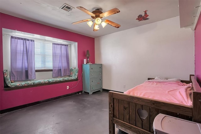 bedroom with ceiling fan, concrete floors, visible vents, and baseboards