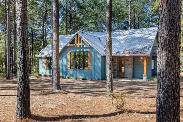 rustic home with metal roof