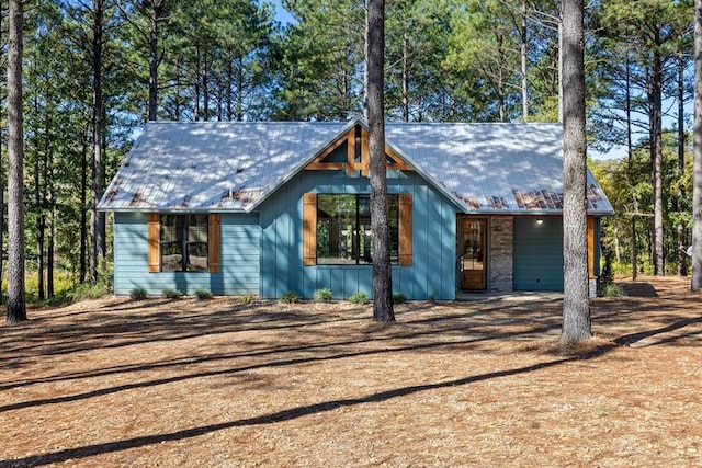 view of front of house with metal roof