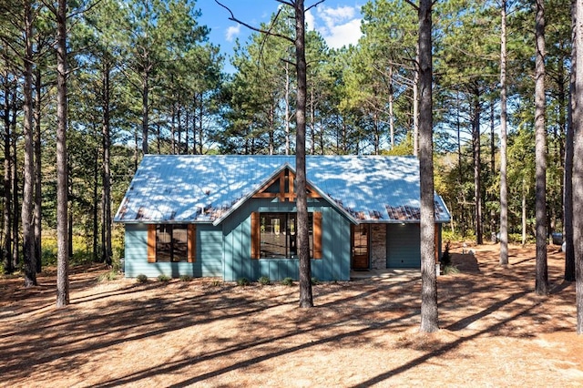 exterior space featuring metal roof