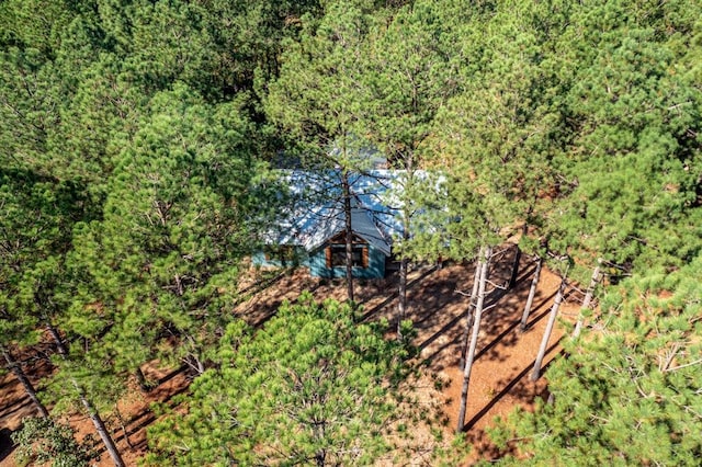 bird's eye view featuring a forest view