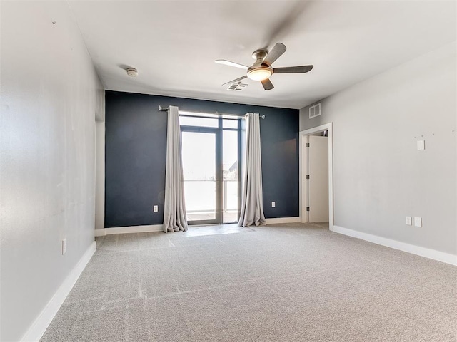 444 N Central Ave Unit 110, Oklahoma City, OK 73104 - carpeted empty room with a ceiling fan and baseboards