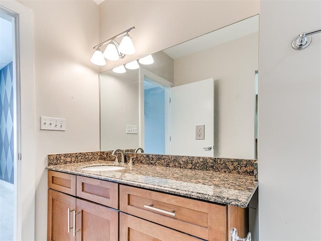 444 N Central Ave Unit 110, Oklahoma City, OK 73104 - bathroom with vanity and baseboards