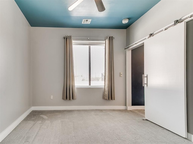 444 N Central Ave Unit 110, Oklahoma City, OK 73104 - unfurnished room featuring carpet, ceiling fan, baseboards, and a smoke detector