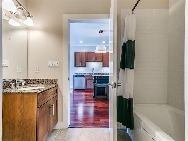 444 N Central Ave Unit 110, Oklahoma City, OK 73104 - full bathroom with tile patterned floors, vanity, and shower / bath combination with curtain