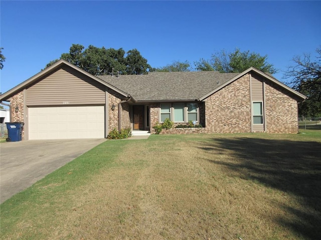 view of front of house featuring driveway, roof with shingles, an attached garage, a front lawn, and brick siding