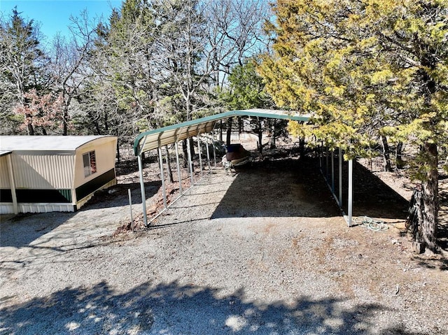 exterior space with a detached carport