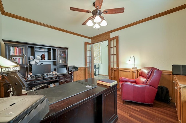 office space featuring ceiling fan, ornamental molding, dark wood-style flooring, and wainscoting