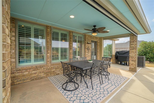 view of patio / terrace with ceiling fan, outdoor dining area, a grill, and central air condition unit