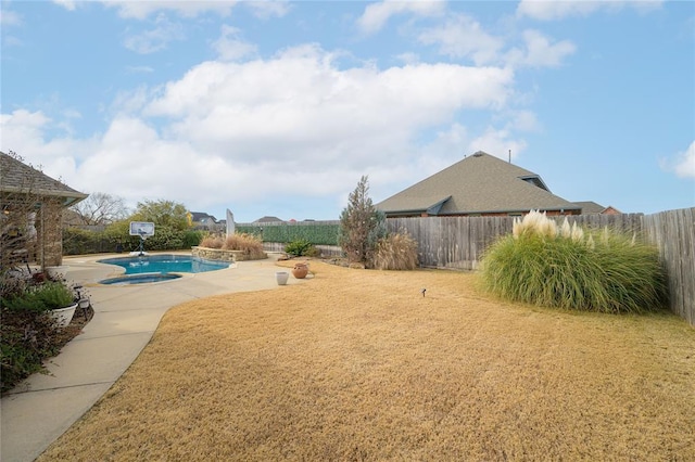 view of yard featuring a patio area, a fenced backyard, and a fenced in pool