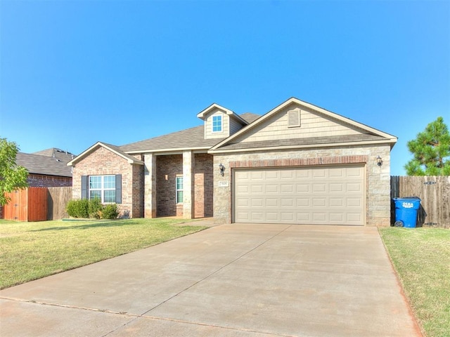 view of front facade featuring a front yard, driveway, an attached garage, and fence