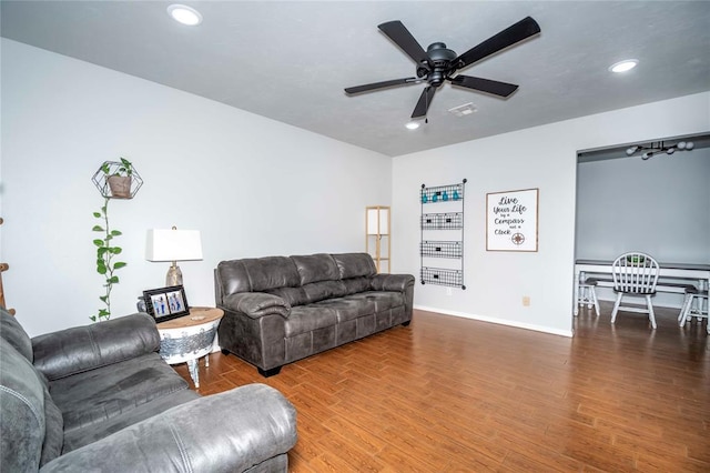 living room featuring ceiling fan, recessed lighting, wood finished floors, visible vents, and baseboards