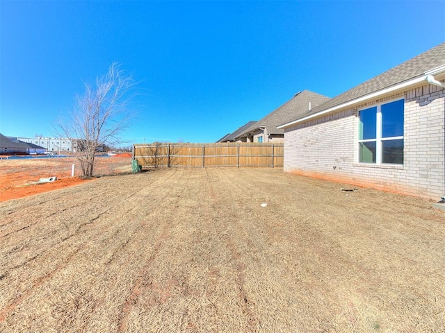 view of yard with fence