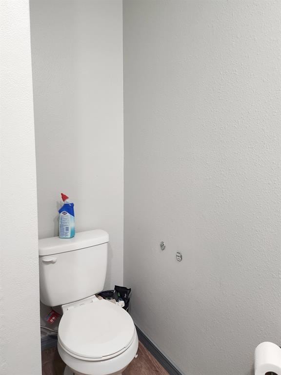 bathroom featuring toilet