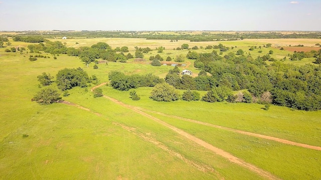 birds eye view of property featuring a rural view