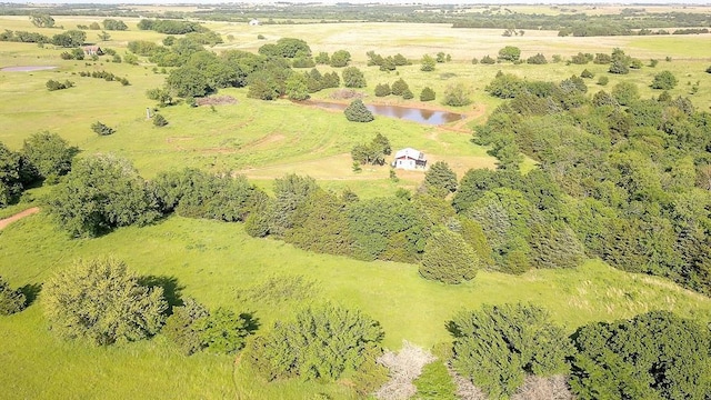 drone / aerial view with a rural view and a water view