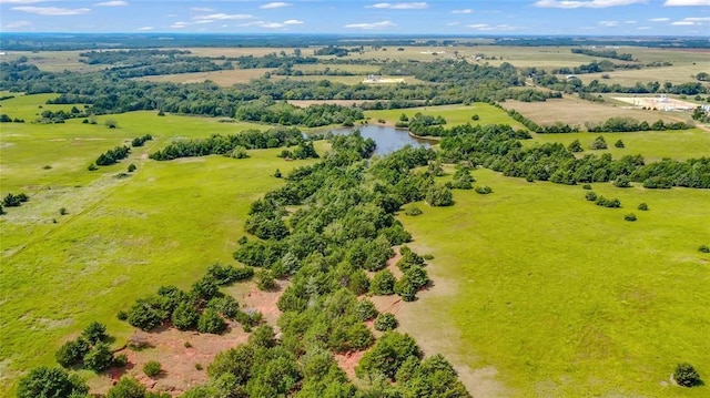 aerial view with a water view and a rural view