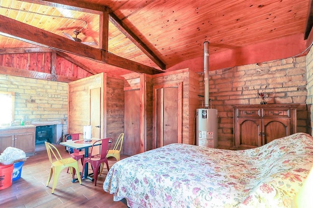 bedroom with wood ceiling, water heater, vaulted ceiling with beams, and a fireplace