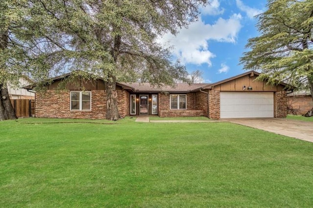 ranch-style house featuring an attached garage, brick siding, driveway, and a front lawn