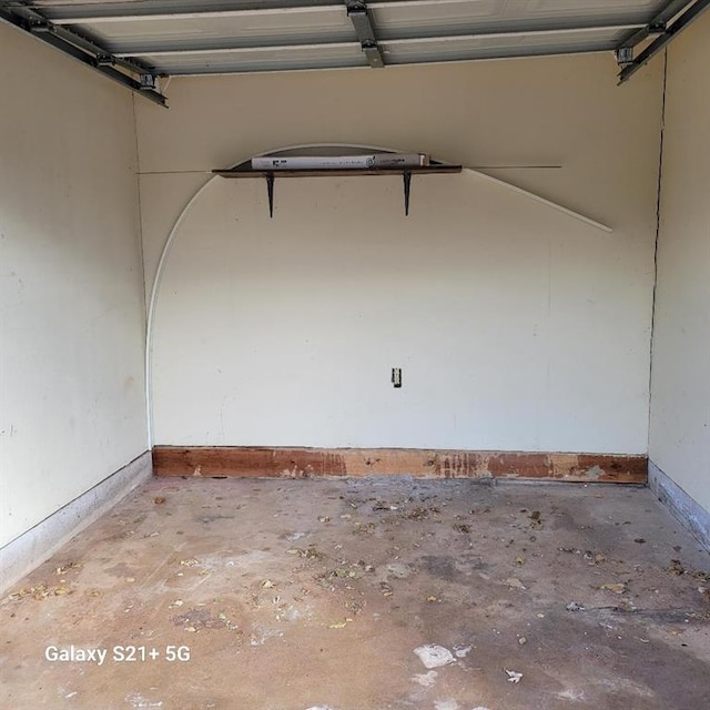 garage featuring baseboards