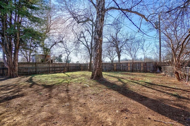 view of yard featuring a fenced backyard