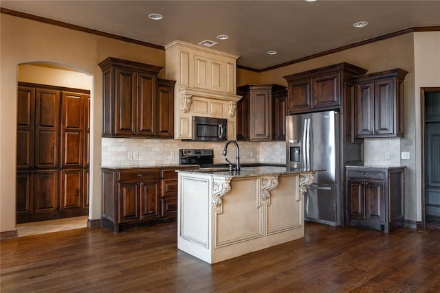 kitchen with dark wood finished floors, light stone counters, dark brown cabinets, stainless steel refrigerator with ice dispenser, and a sink