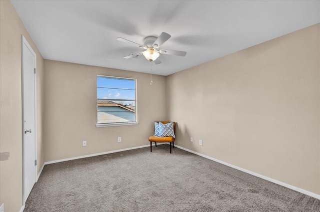 unfurnished room featuring baseboards, a ceiling fan, and carpet flooring