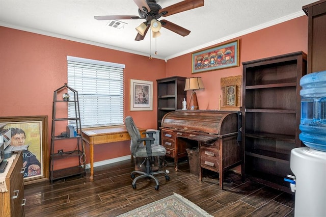 office featuring a ceiling fan, baseboards, visible vents, wood finish floors, and ornamental molding