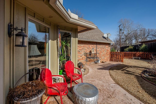 view of patio / terrace with fence