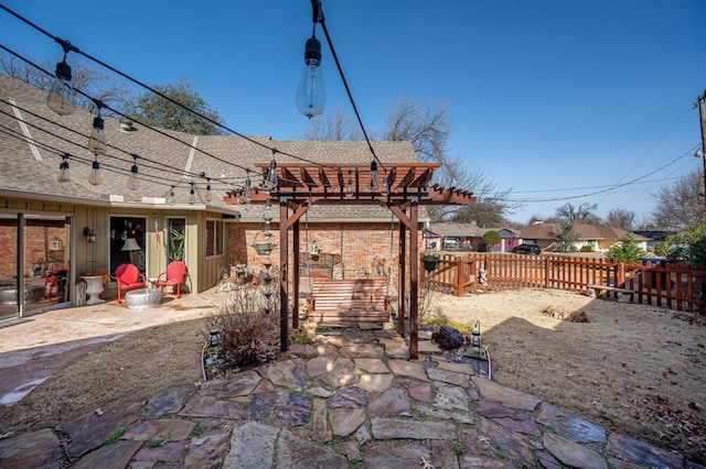 view of patio / terrace featuring a fenced backyard and a pergola