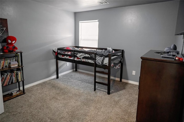 bedroom featuring baseboards, visible vents, and carpet flooring