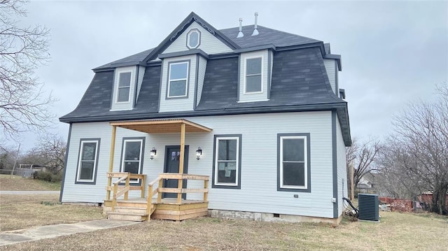 view of front facade with crawl space, a shingled roof, a porch, and cooling unit