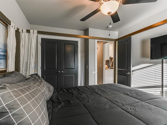 bedroom with a closet and ceiling fan